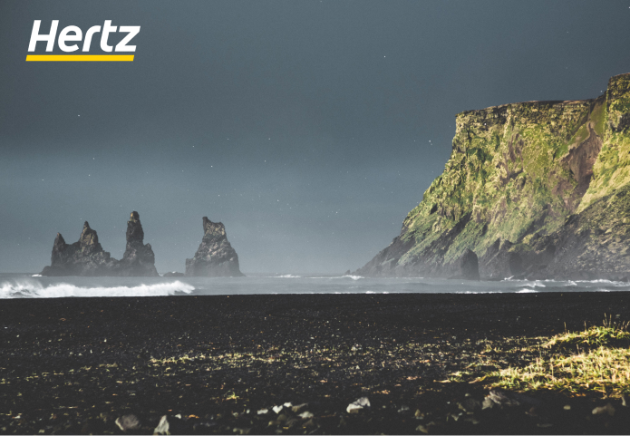 Hire a car and drive to the Reynisfjara black sand beach of Iceland 