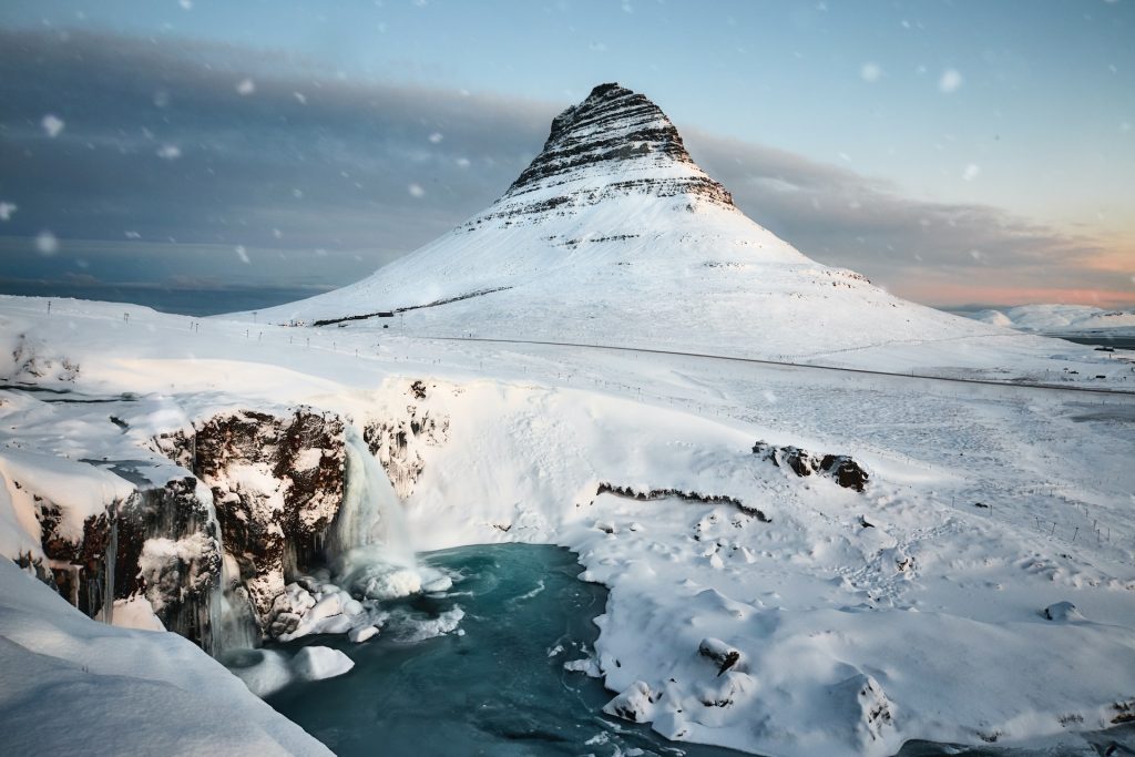 the Kirkjufell Iceland covered in snow 