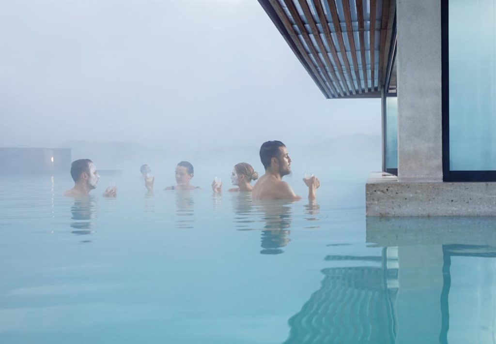 Visitors can have drinks inside the Blue Lagoon Spa in Iceland