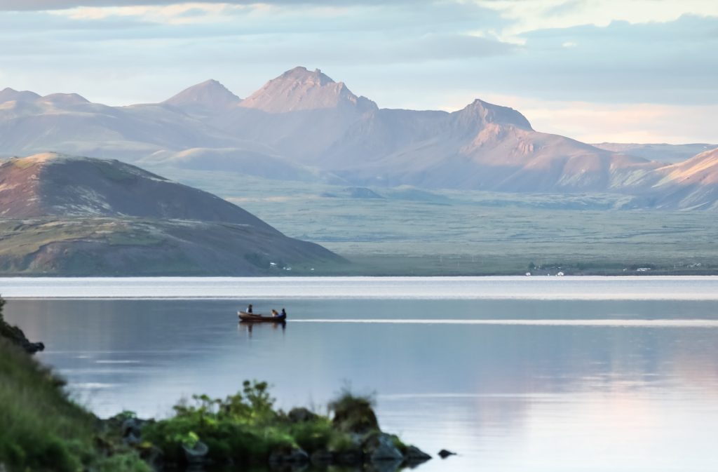 A summer in Iceland. A boat on the lake Þingvallavatn.