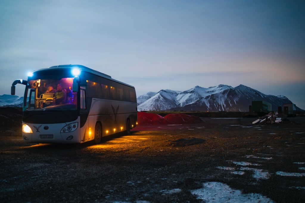 some people join bus tours to travel around Iceland
