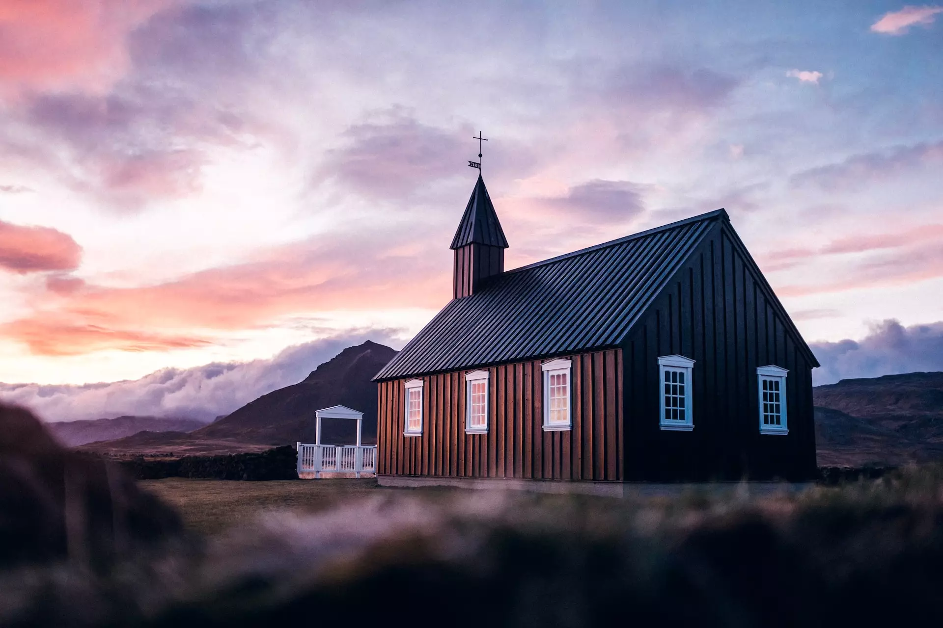 The minimalist Black Church of Búðikirkja in Snæfellsnes Iceland