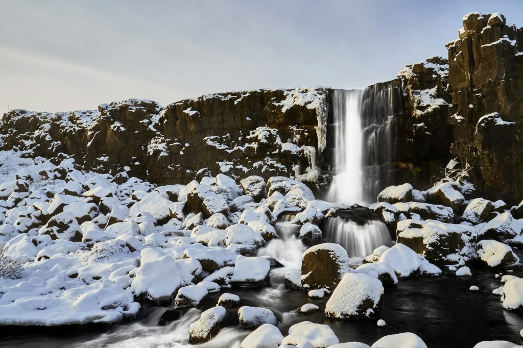 the winter view of  Öxarárfoss waterfall