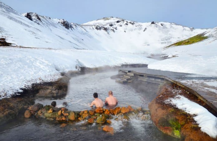 A snowy winter view at the hot spring river in Iceland
