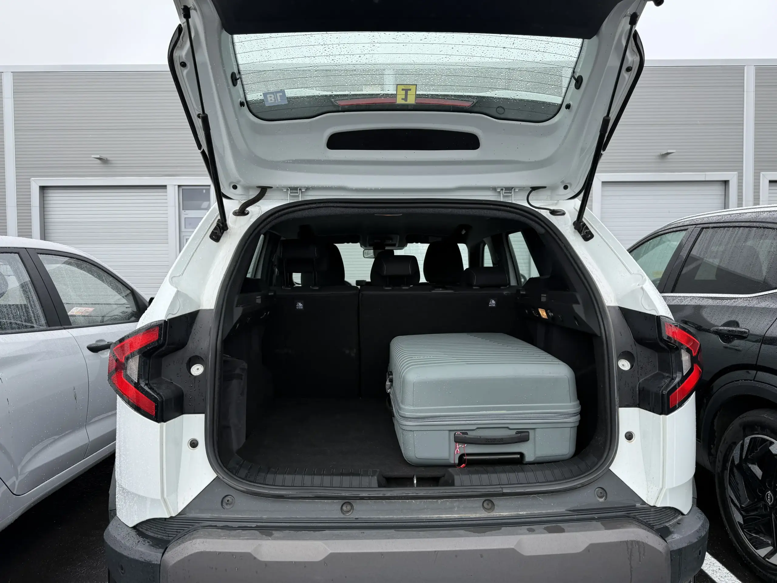 Dacia Duster trunk with 28 inch suitcase Iceland rental