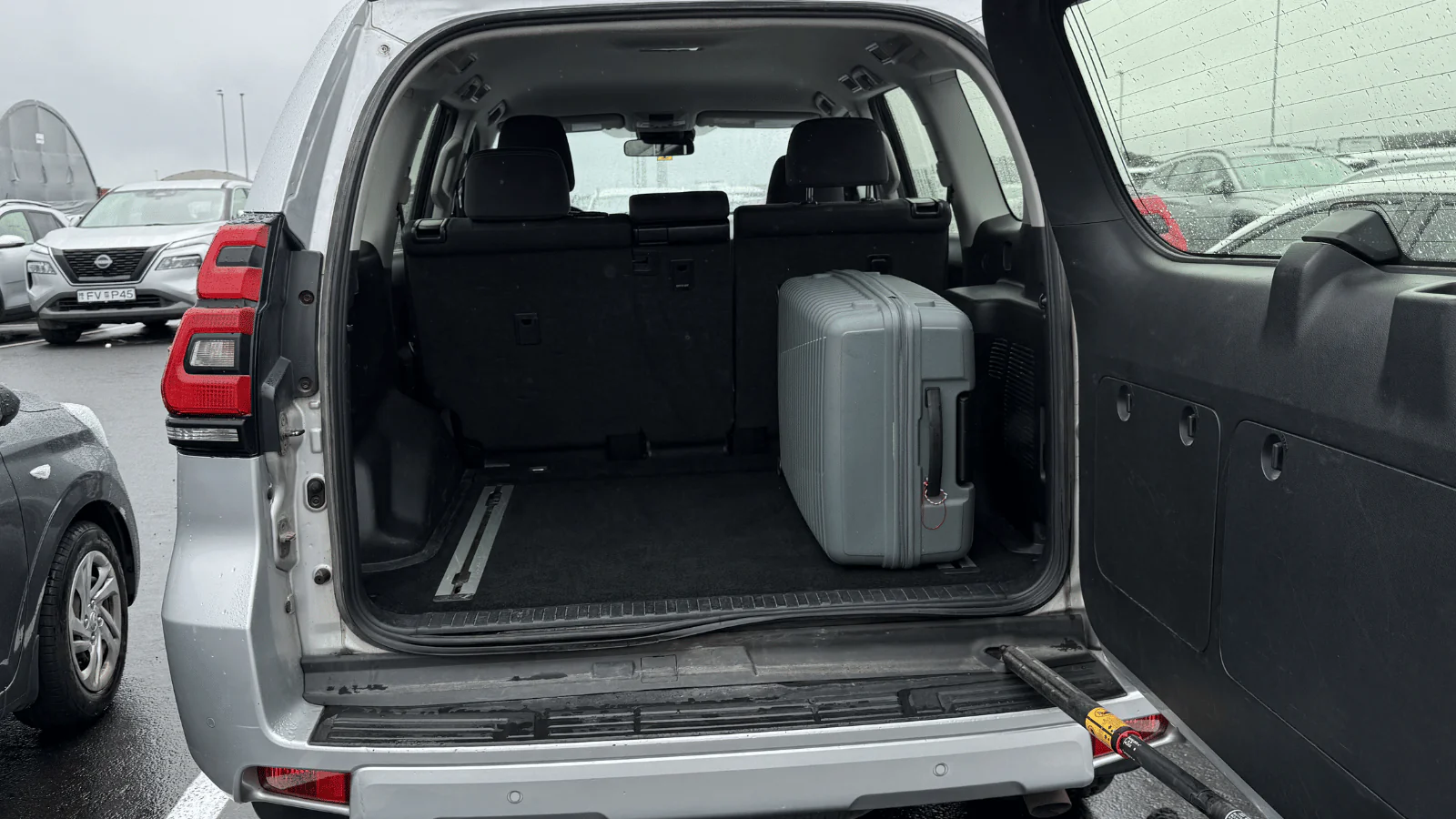Toyota Land Cruiser trunk with 28 inch suitcase Iceland rental