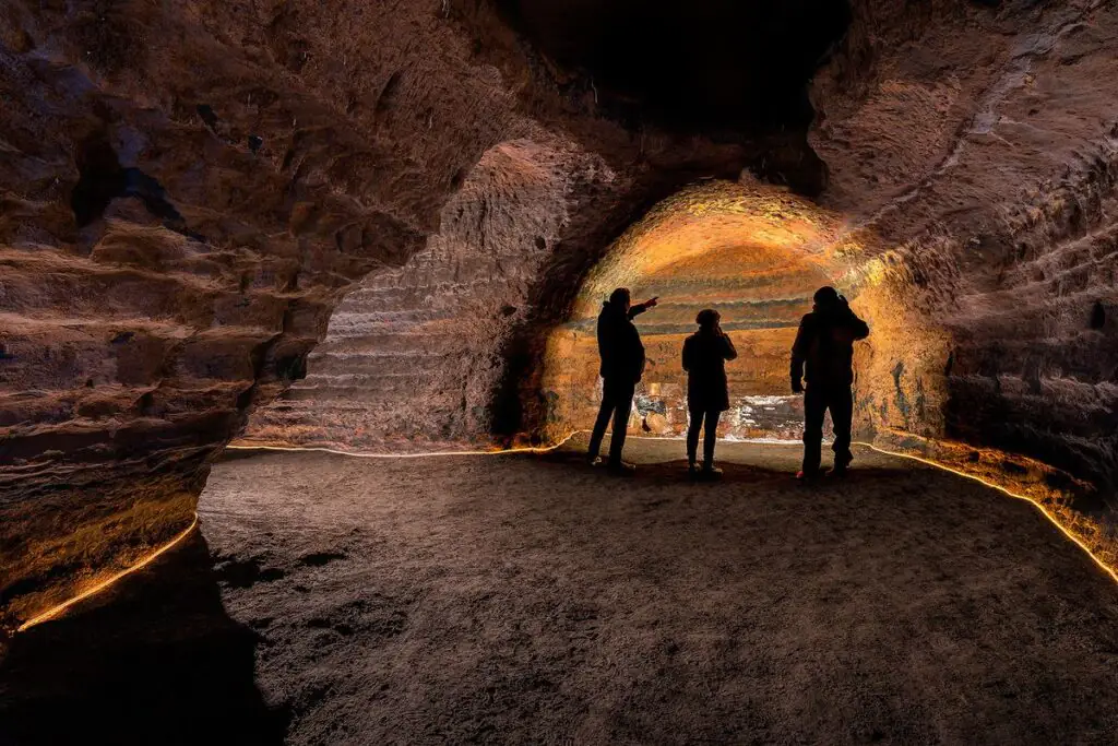 visiting the caves of hella in south iceland with a rental car is the best way