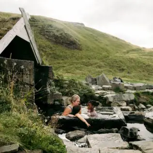 visit a hot spring full of history in Iceland Hrunalaug