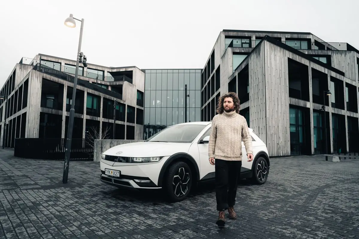 Traveler with a Hertz rental car in Reykjavík